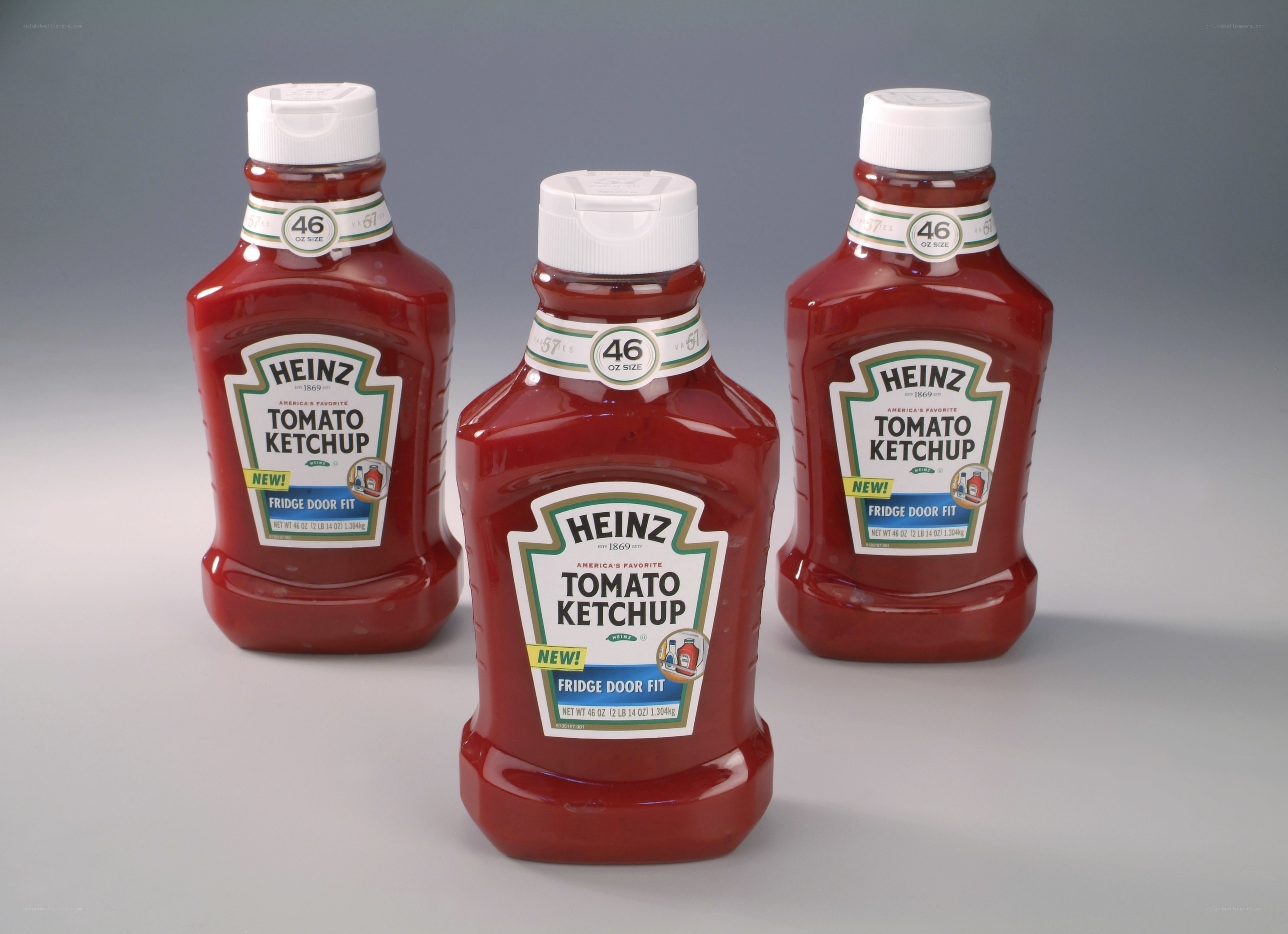 Three Heinz ketchup bottles