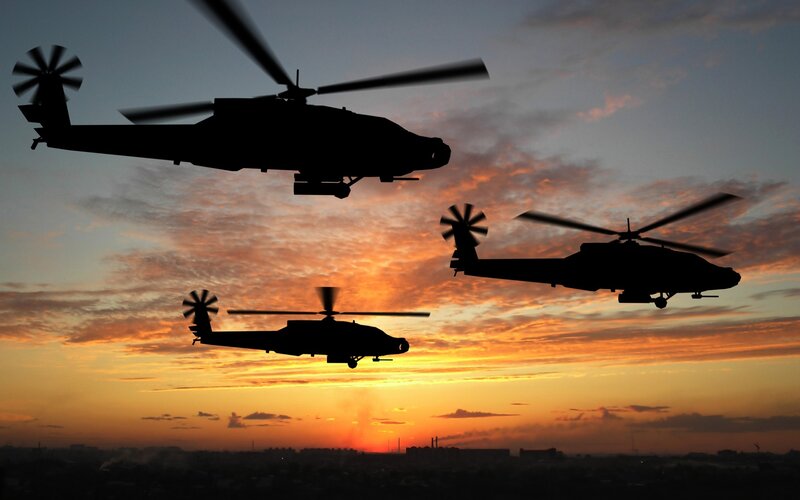 Three Helicopters in Flight — Orange, Dramatic