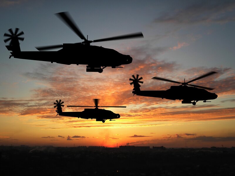 Three Helicopters in Flight — Orange