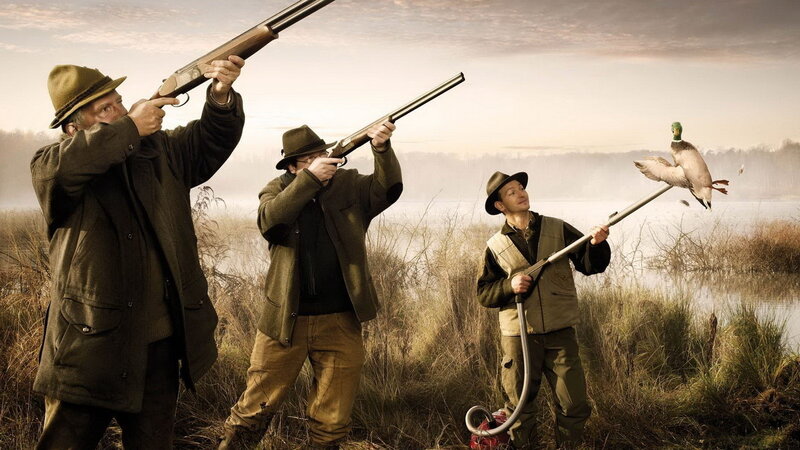 Three Hunters with Shotguns