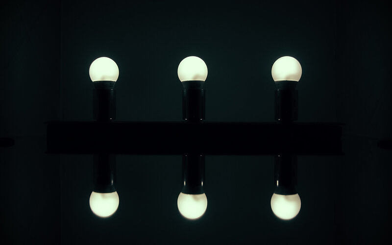three illuminated bulbs