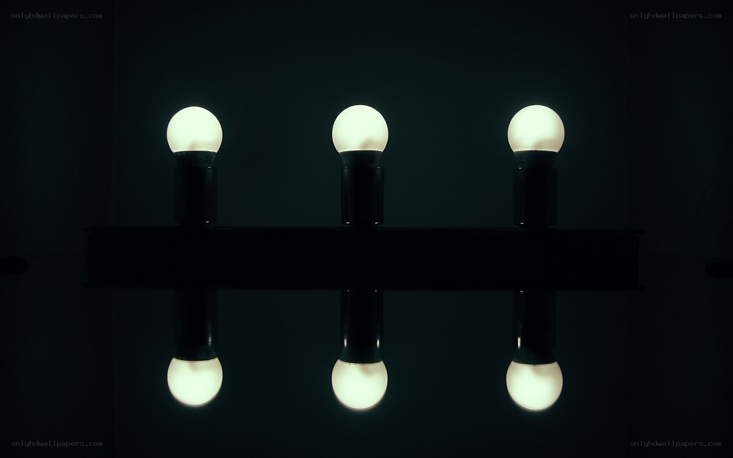 three illuminated bulbs