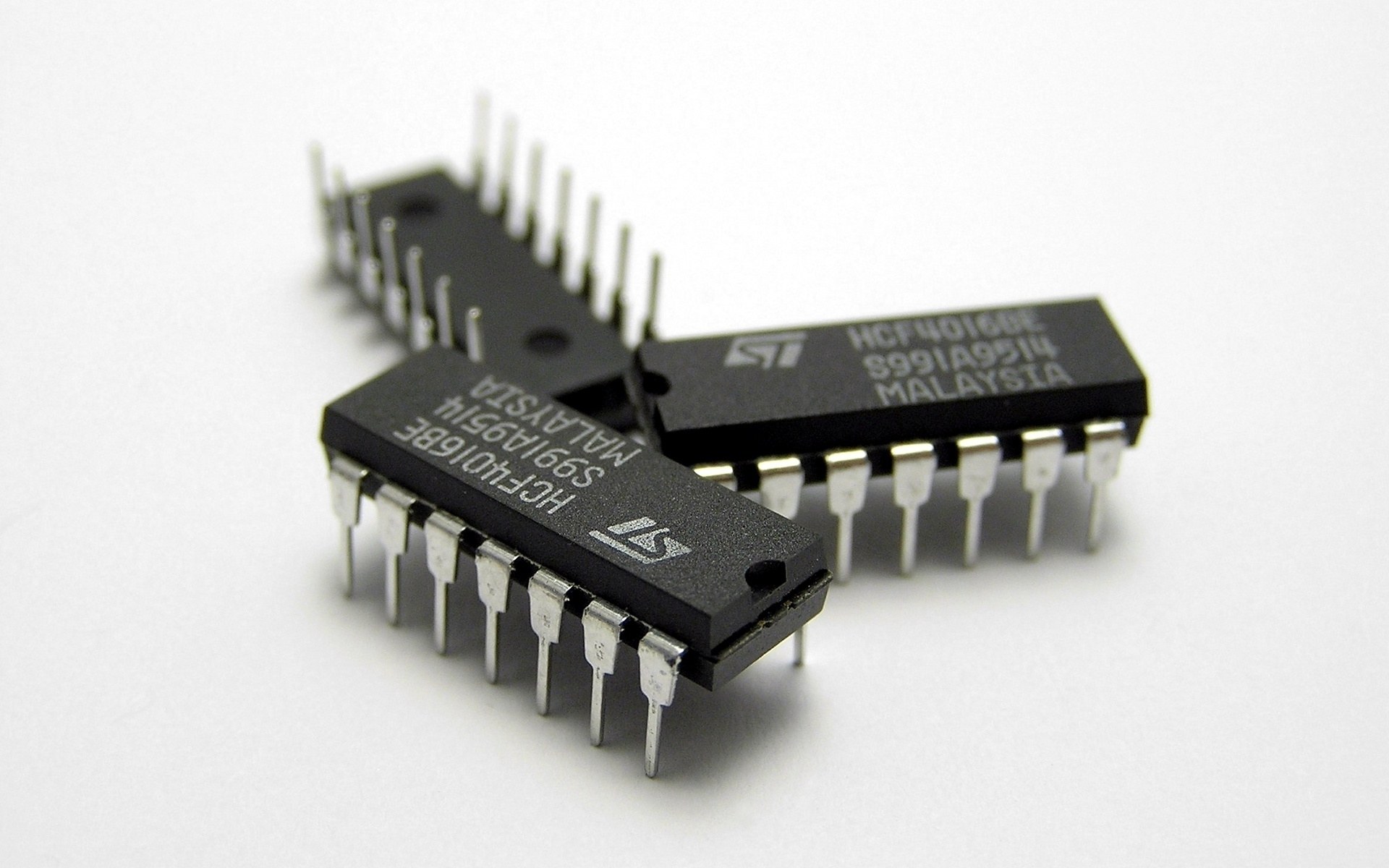 three integrated circuits on white