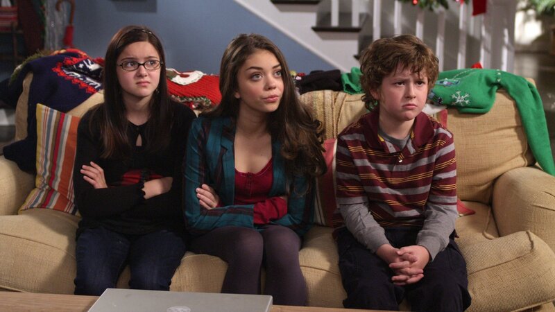three kids on a couch