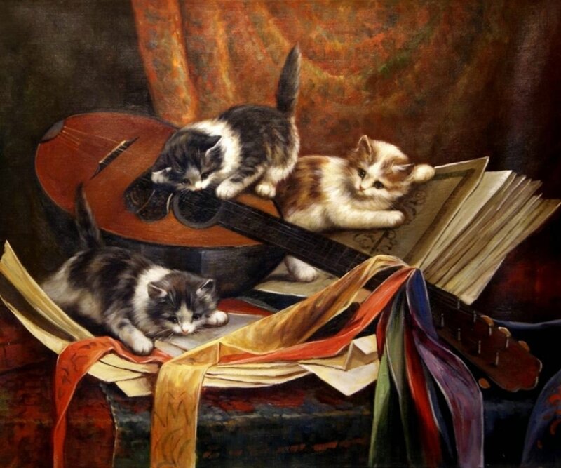 Three Kittens on Books