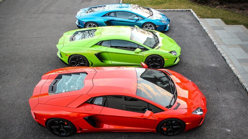 Three Lamborghini Aventadors — Red