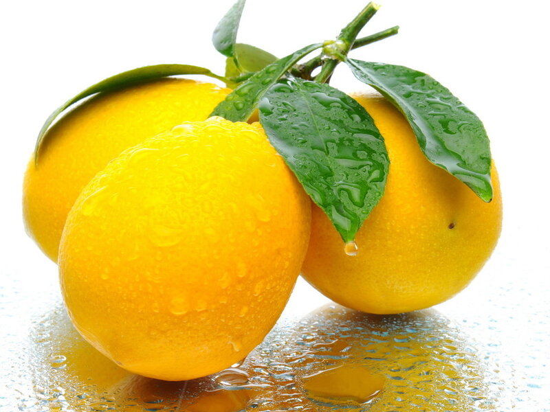 Three Lemons with Leaves
