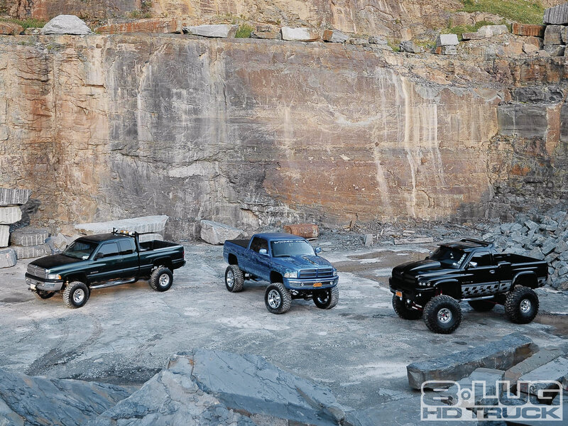 Three Lifted Trucks