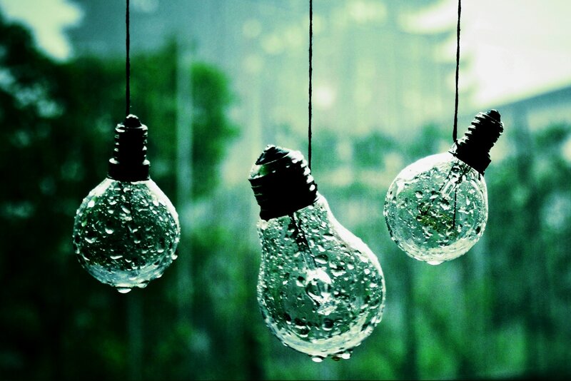 Three Light Bulbs in Rain — Green, Moody