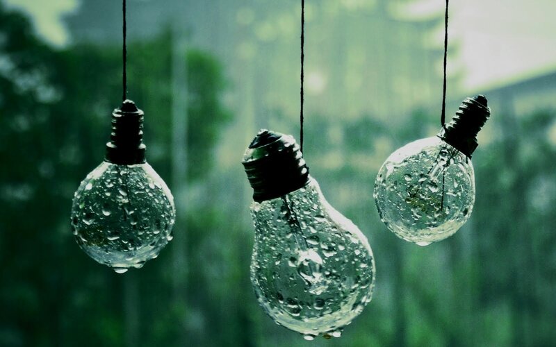 Three Light Bulbs in Rain
