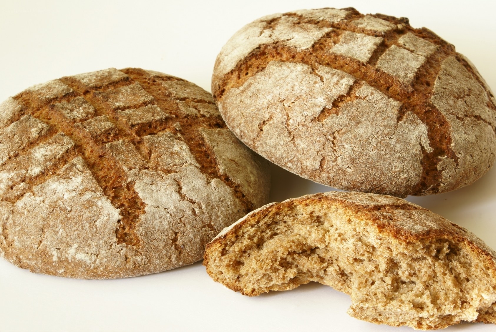 Three loaves of rustic bread