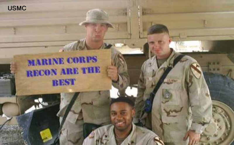 Three Marines with Sign