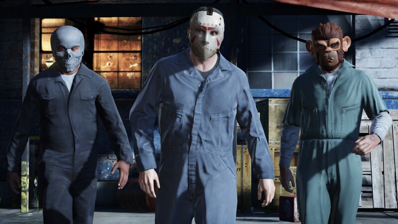 Three masked figures in jumpsuits