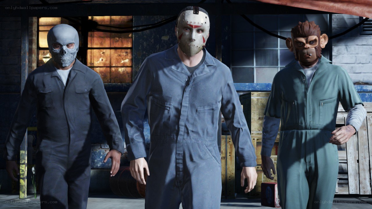 Three masked figures in jumpsuits