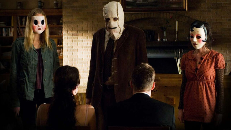 Three Masked People in Room