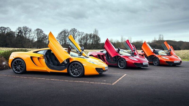 Three McLaren Sports Cars — Yellow, Dramatic, Autumn