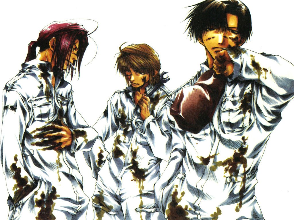 three mechanics in stained uniforms