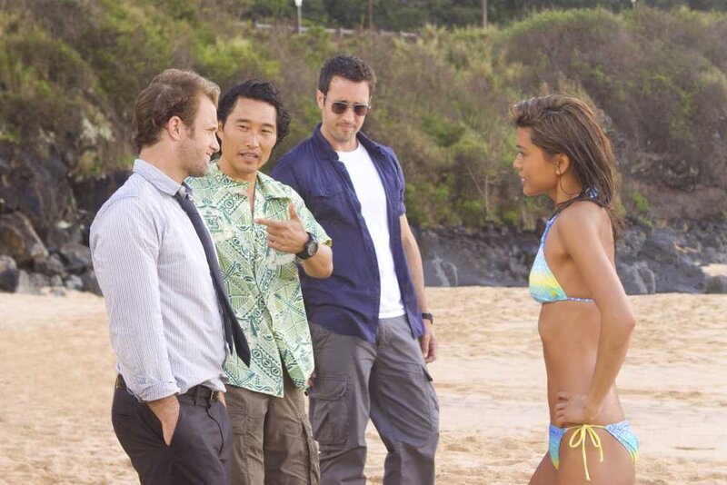 Three Men and a Woman on Beach
