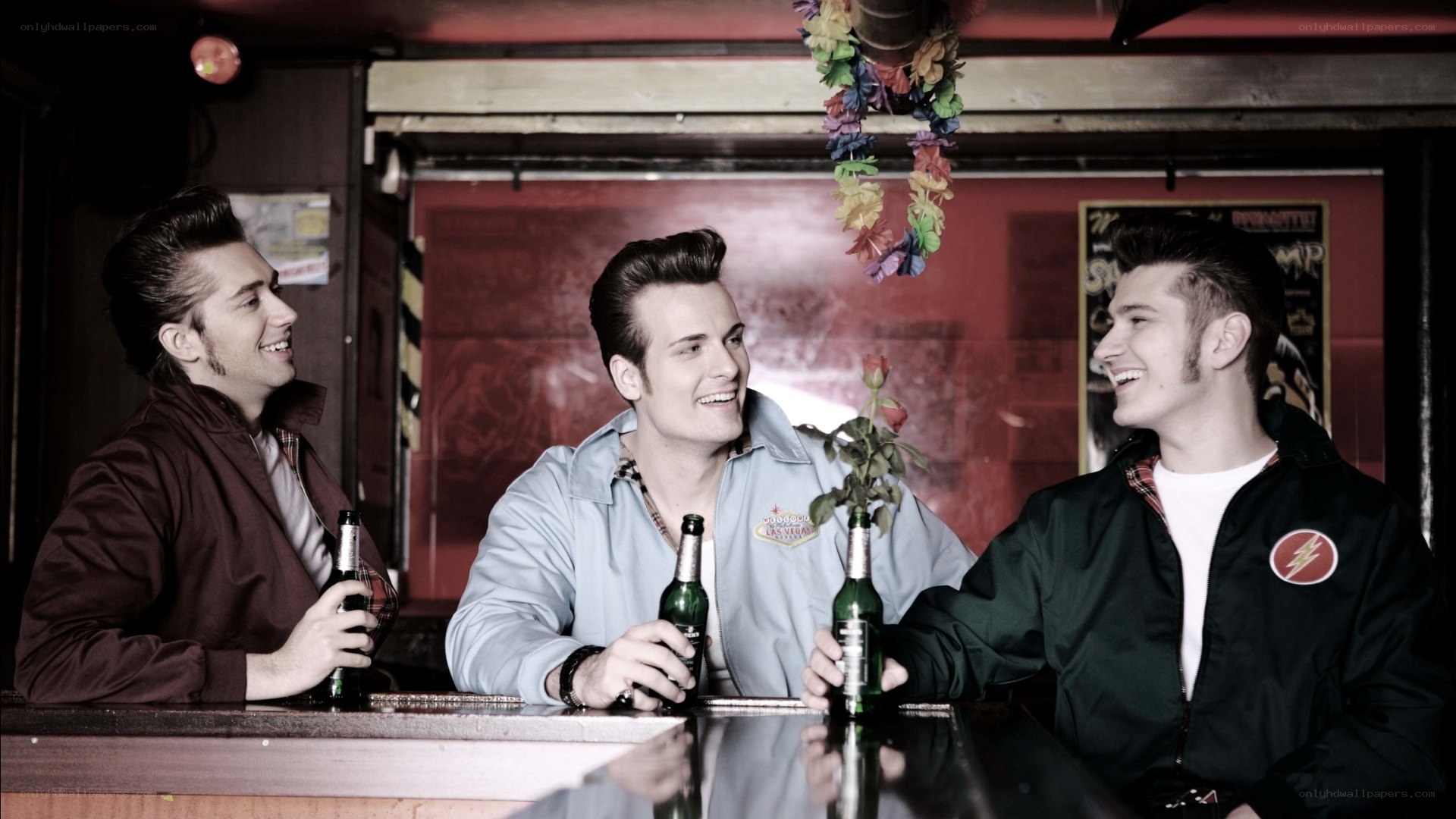 Three men at a bar