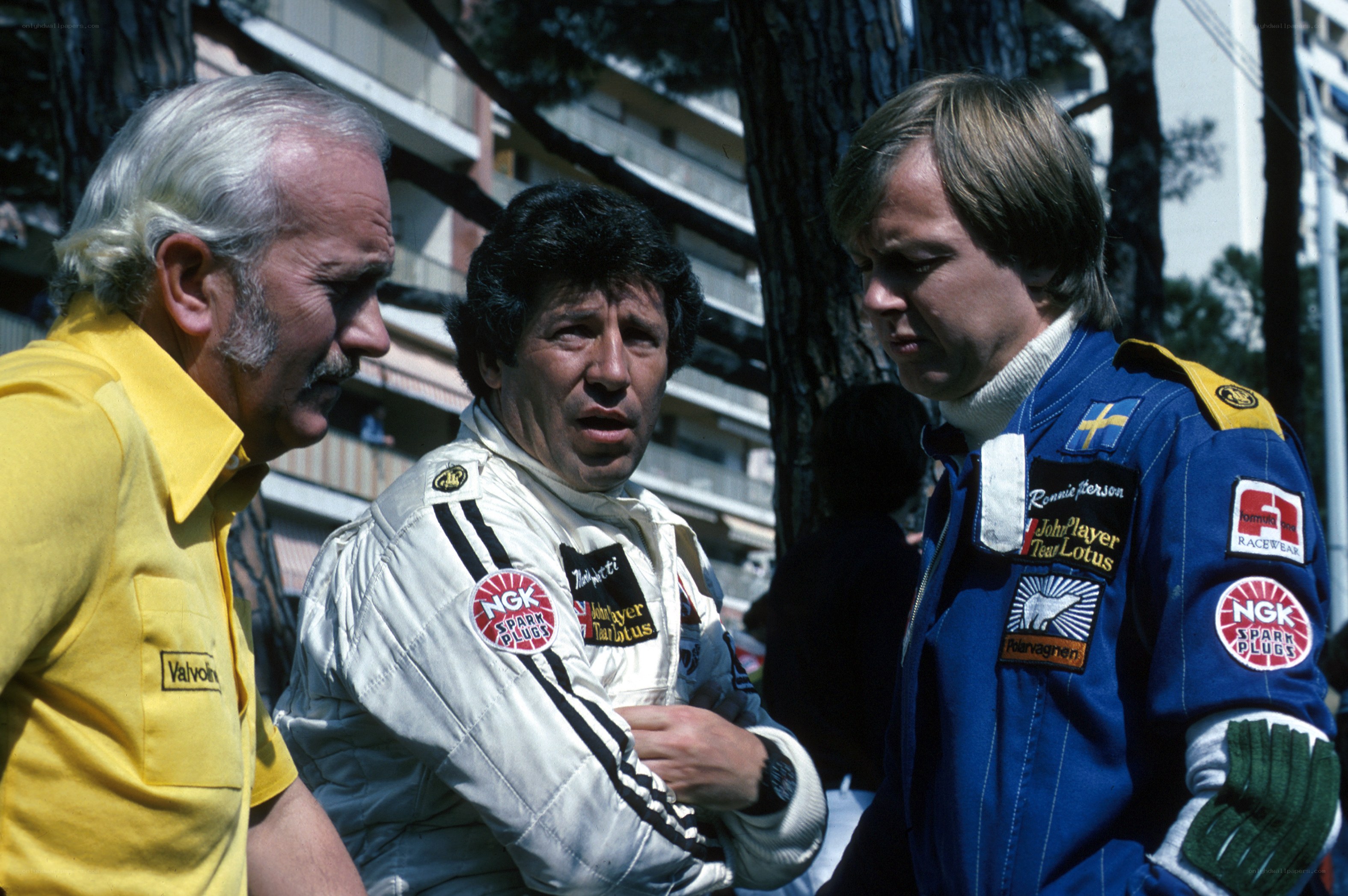 Three men at a race event