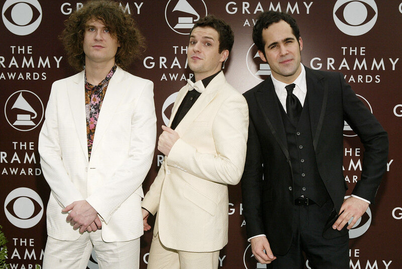 Three men at the Grammy Awards