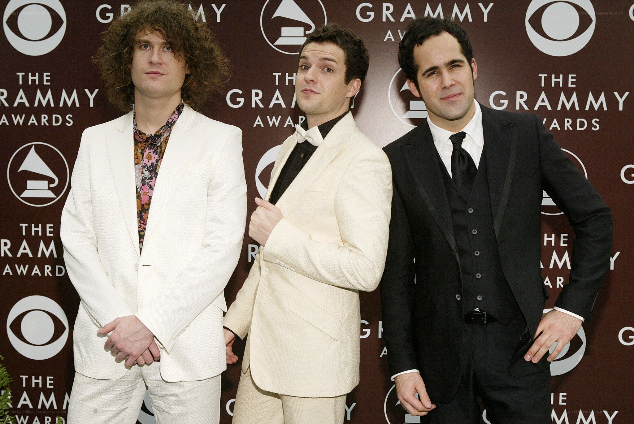 Three men at the Grammy Awards