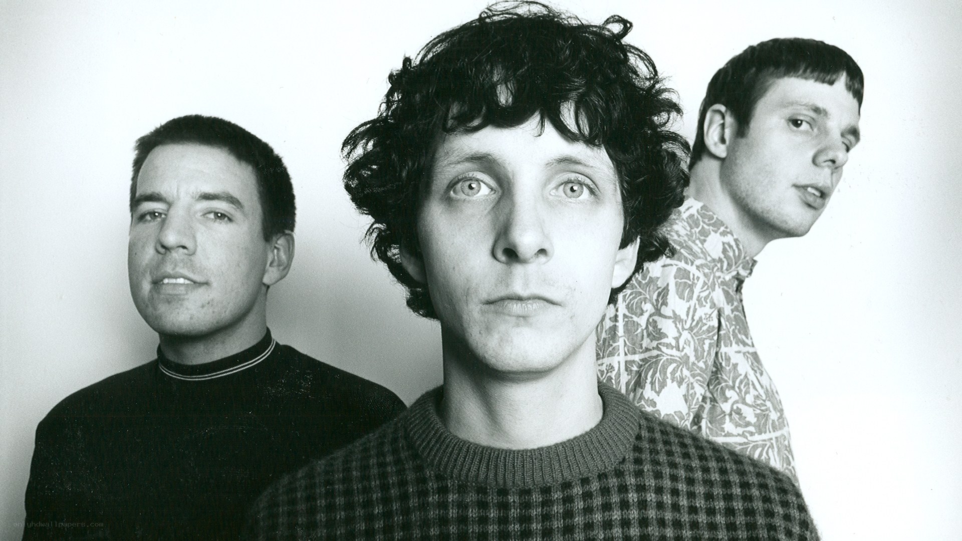 three men in a band photo