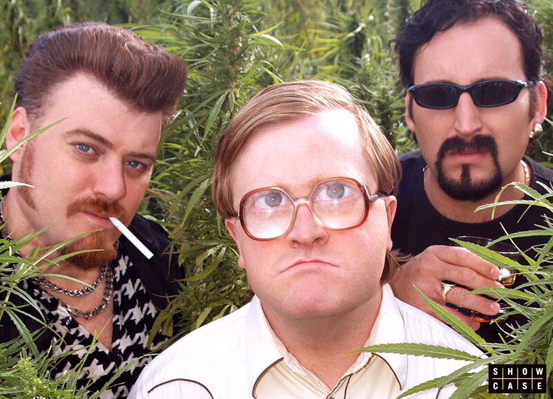three men in a cannabis field