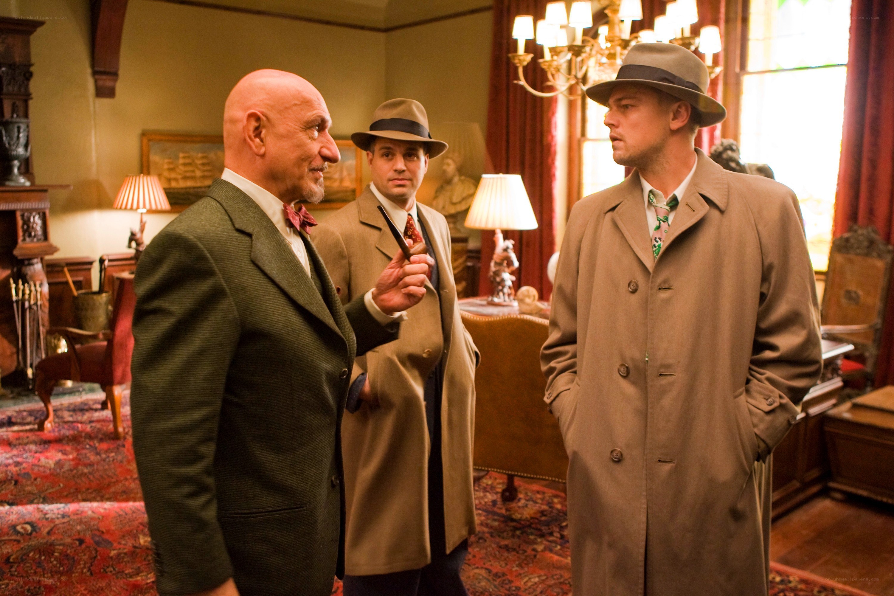 Three men in a formal room