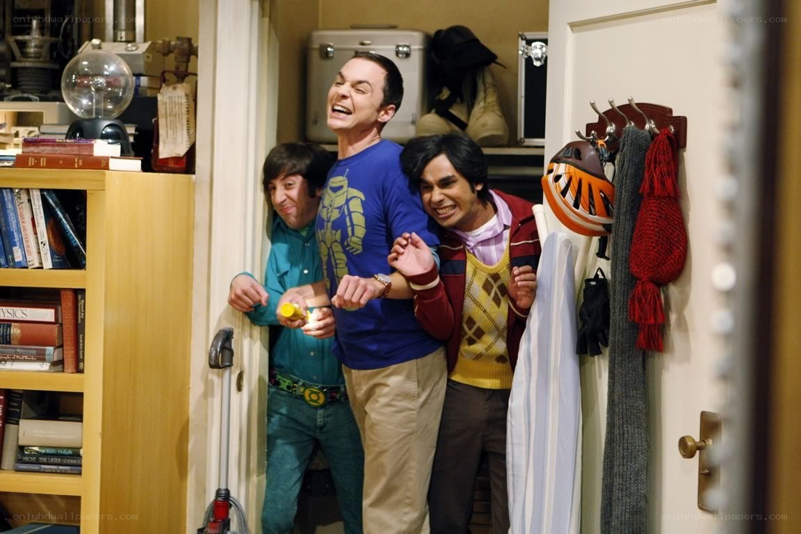Three men in a hallway