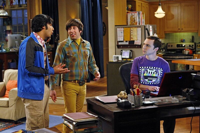 Three men in a living room