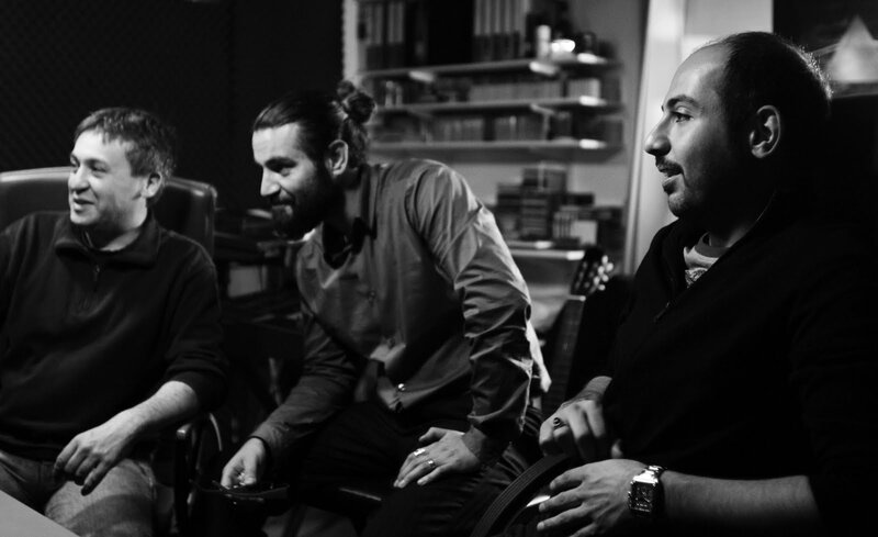 Three Men in a Room — Black, Neutral