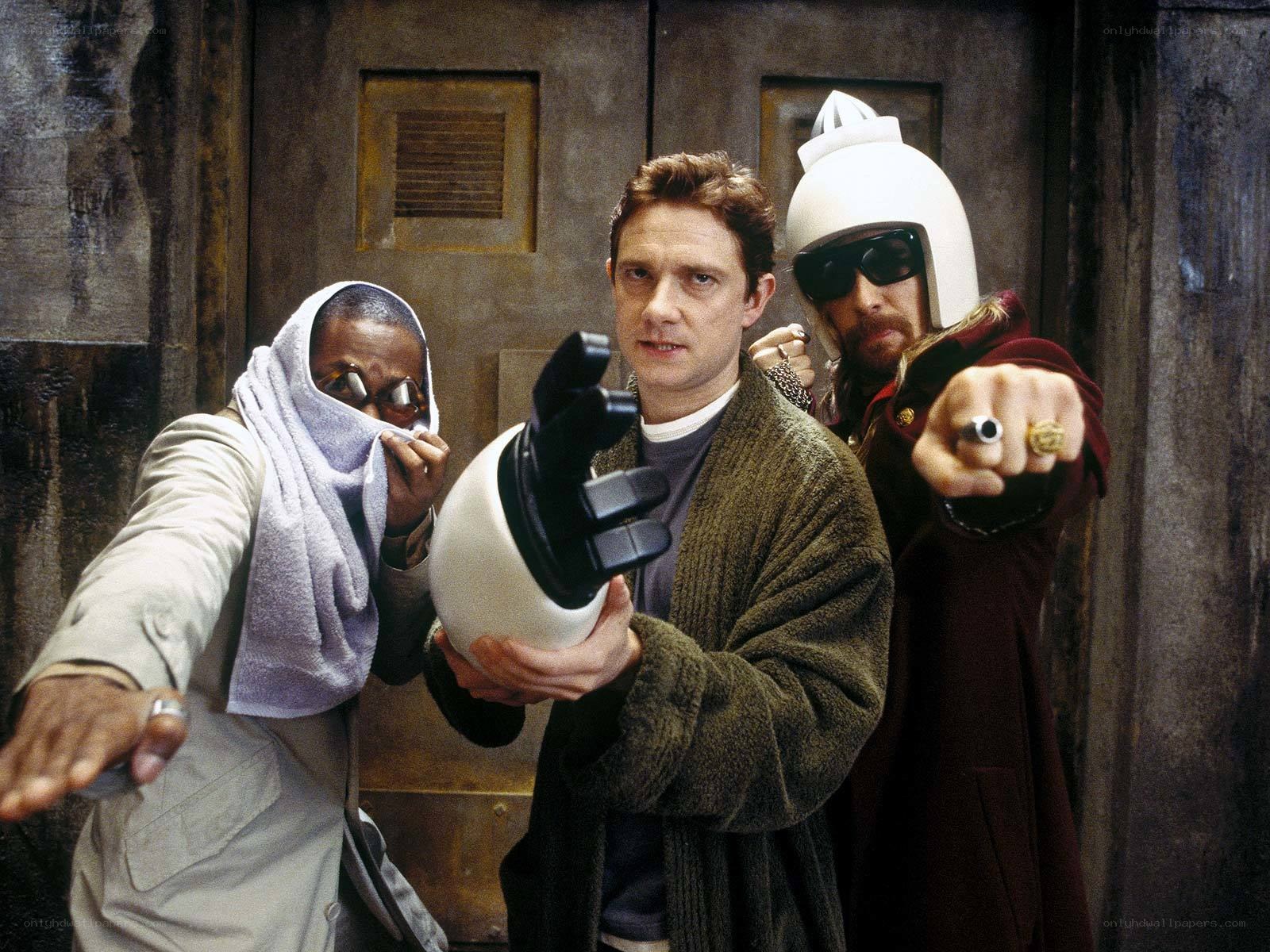 Three men in a sci-fi scene