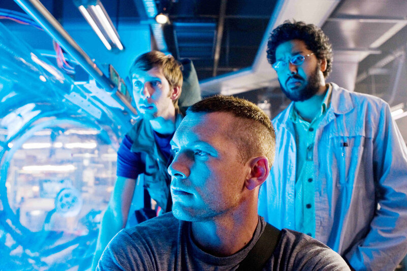 three men in a sci-fi setting