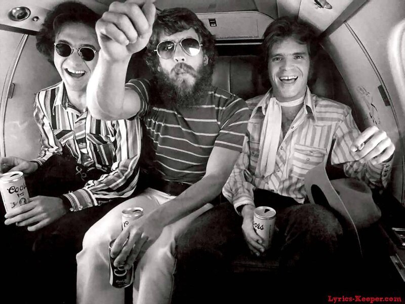 Three men in a vehicle