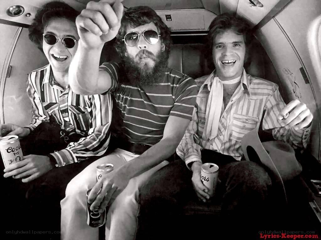 Three men in a vehicle