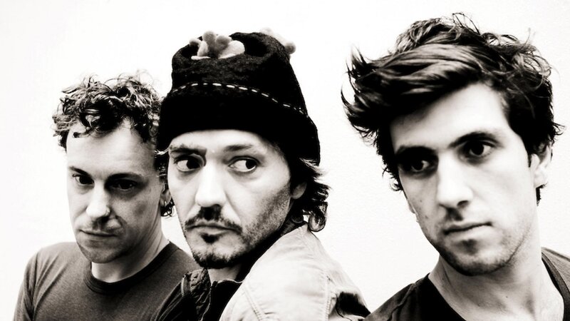 three men in black and white photo