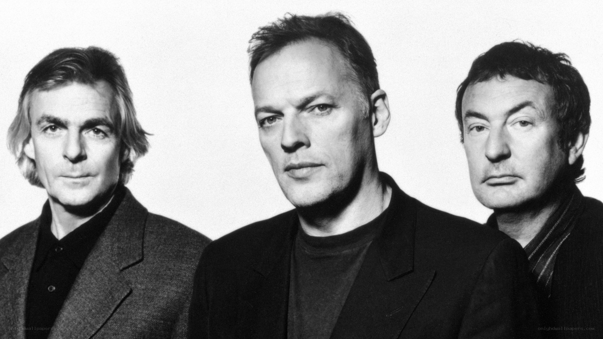 three men in black and white portrait