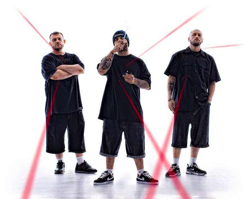 Three Men in Black Clothing — Confident
