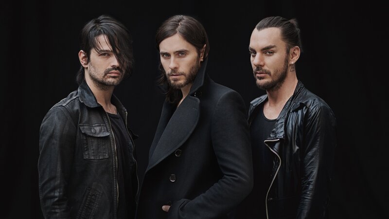 Three Men in Black Clothing — Serious, Photograph, Jackets