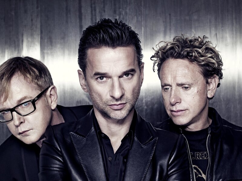 three men in black leather jackets
