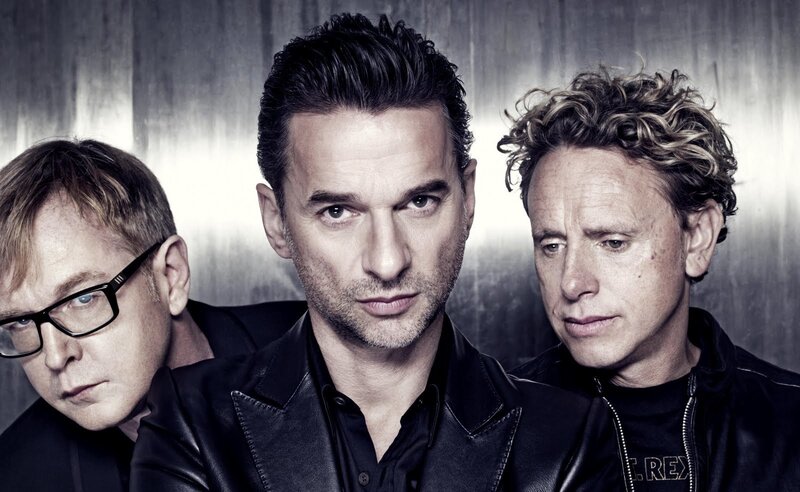 three men in black leather jackets