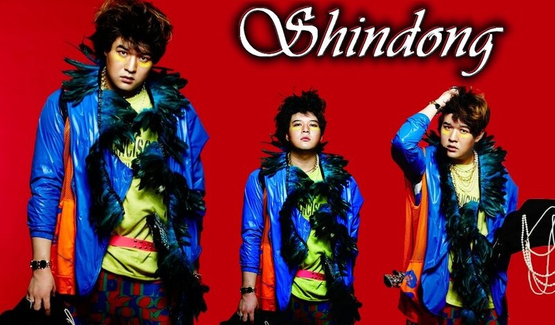Three Men in Colorful Outfits