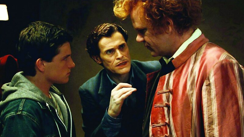 Three Men in Conversation — Brown