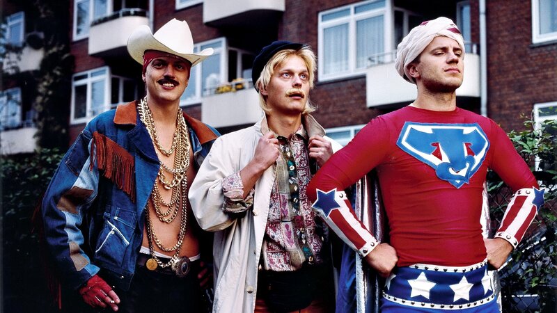 Three men in costumes