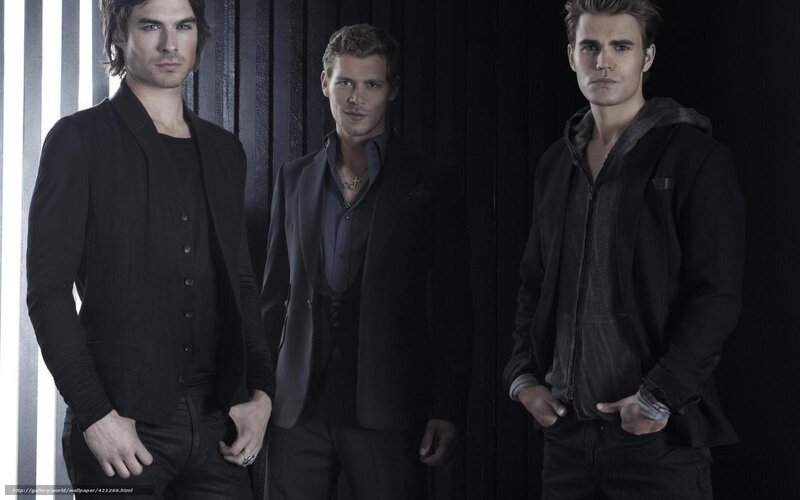 three men in dark clothing