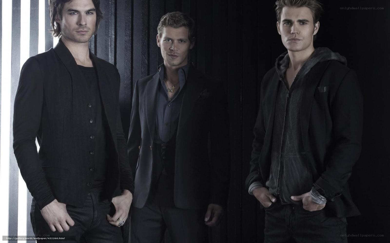 three men in dark clothing