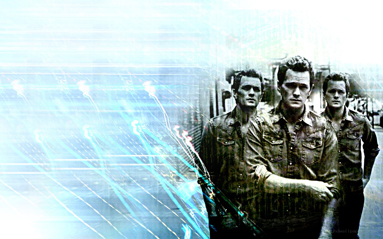 three men in denim shirts