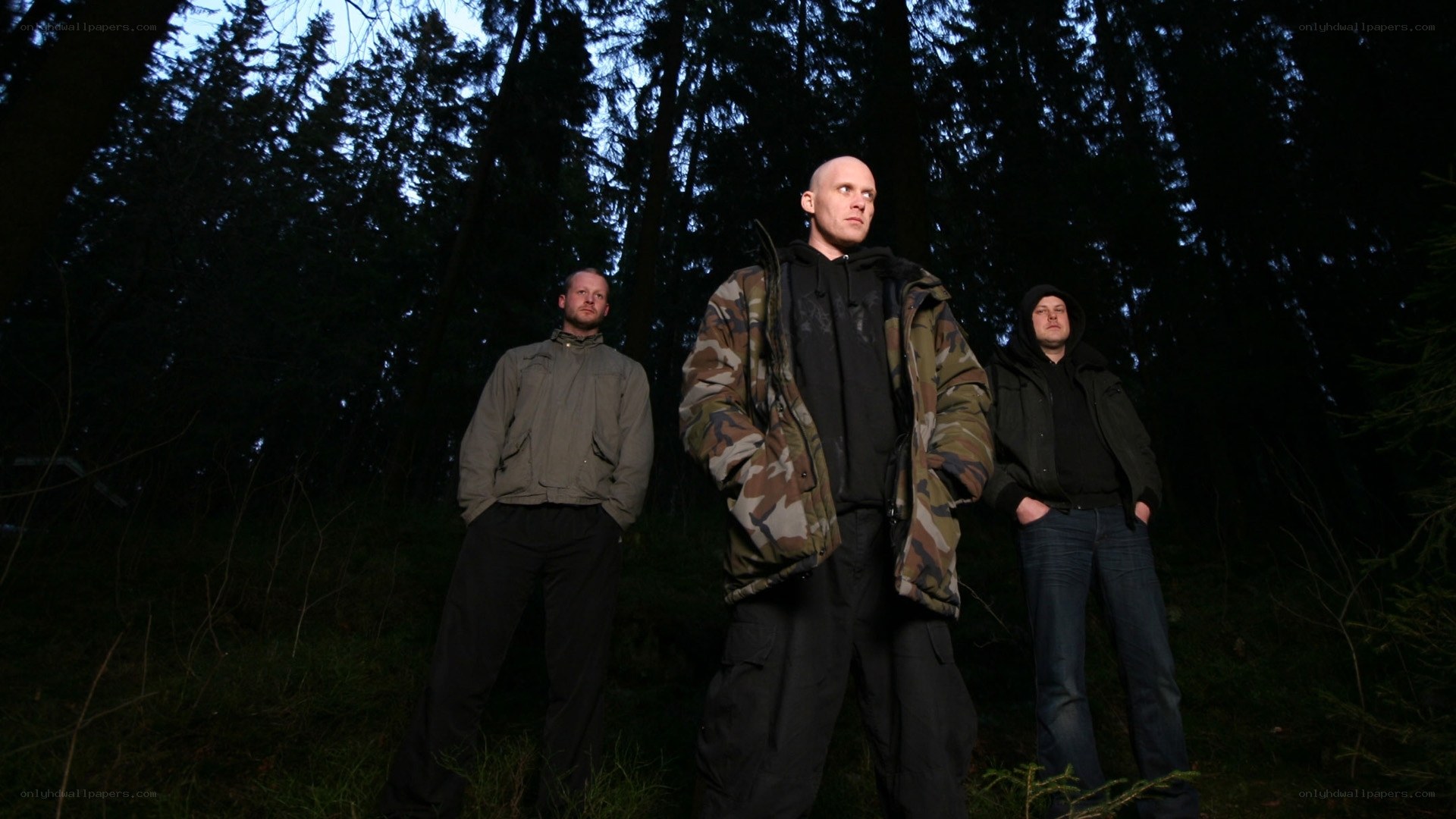three men in forest at night