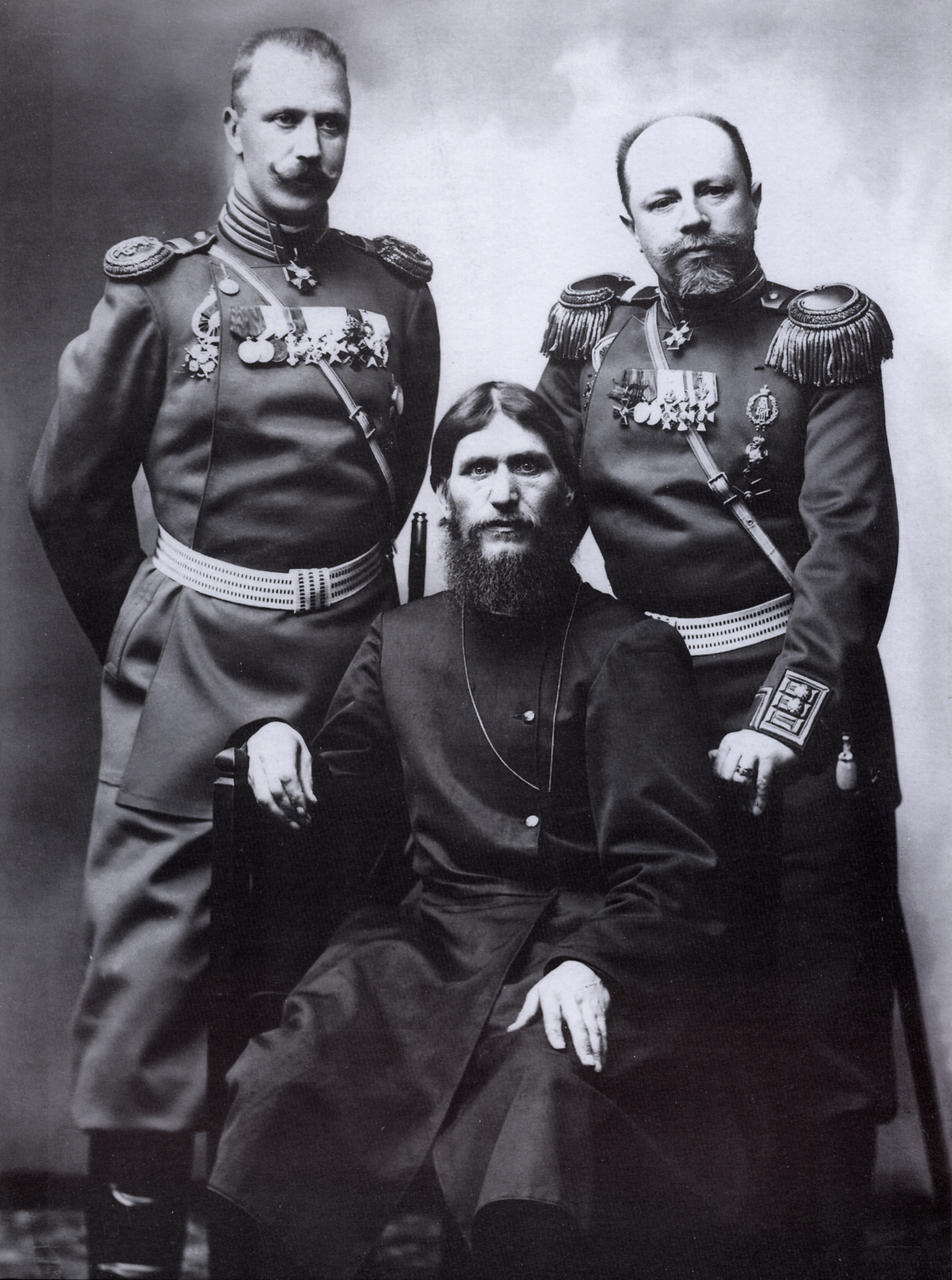 Three men in formal attire